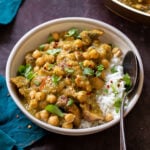bowl of Andhra green chili chickpeas next to the pan