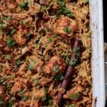close-up of baked Lucknowi biryani in the pan