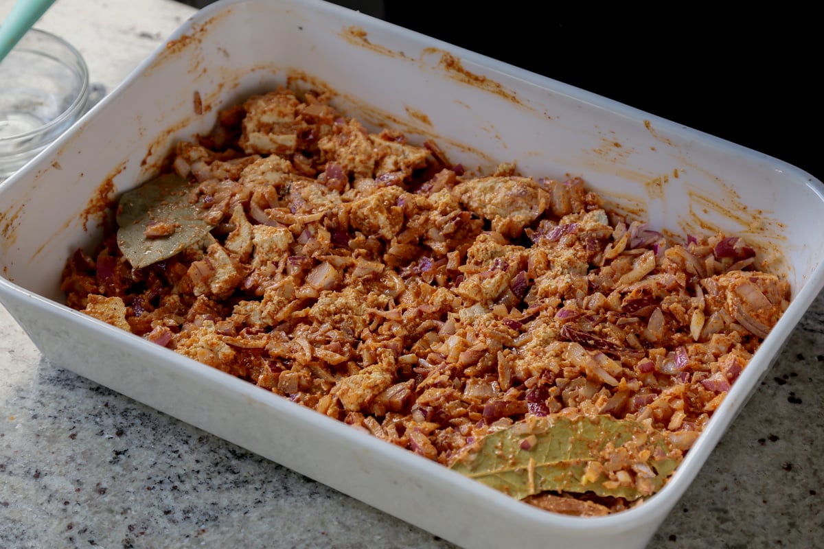 tofu, onion, and spices ready to bake