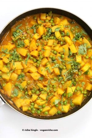 Vegan Bombay Potatoes and Peas | https://veganricha.com Easy Indian Spiced Potato and Pea curry. #vegan #glutenfree #soyfree #Indian