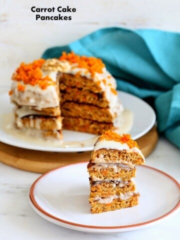 Vegan Carrot Cake Pancakes with roasted carrots and walnuts & loads of spice. Layered with a vegan yogurt coconut cream dressing. breakfast. gluten-free option.  #vegan #glutenfree #veganricha
