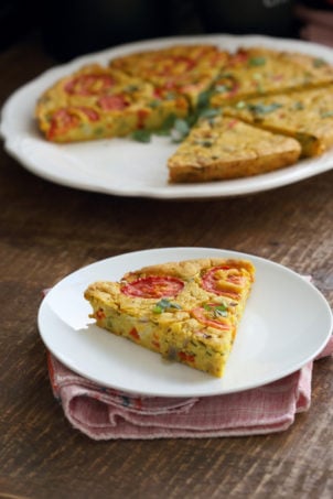 Chickpea Flour Frittata - Eggless Vegan Frittata Recipe. This Chickpea flour frittata is filling, easy and delicious. Use the batter to make pancakes, crepes, crustless quiche. #Vegan #Glutenfree #Soyfree #Nutfree #Recipe #veganricha