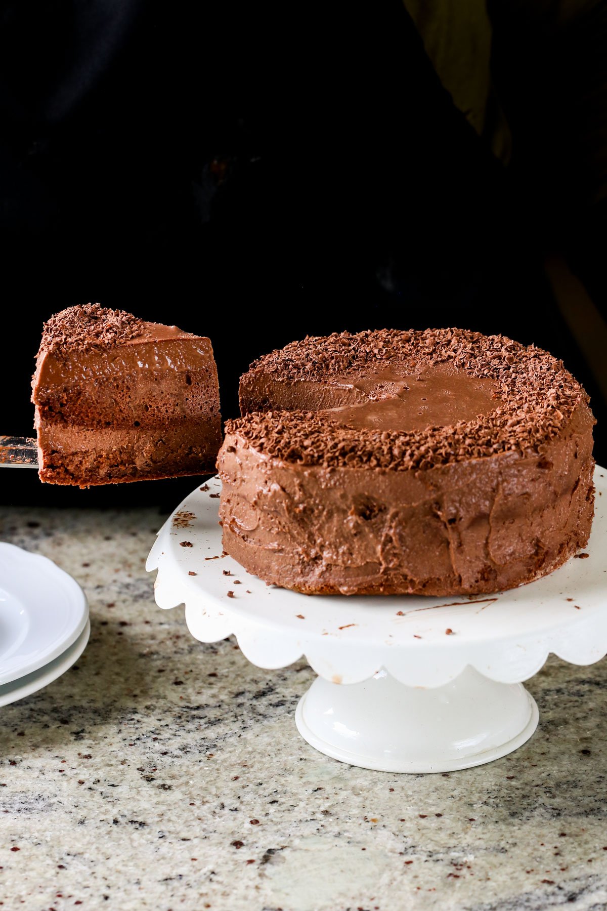 serving a slice of vegan mocha cake