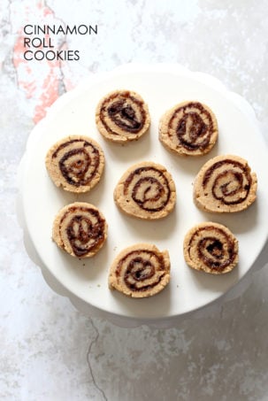 Vegan Cinnamon Roll Cookies. Soft shortbread like cookie dough dusted with cinnamon sugar, rolled, sliced and baked for cinnamon roll bites. #Vegan #Soyfree #VeganRicha #Recipe. 