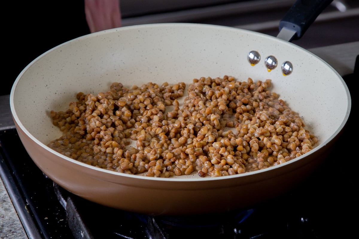 lentils in the pan, before popping