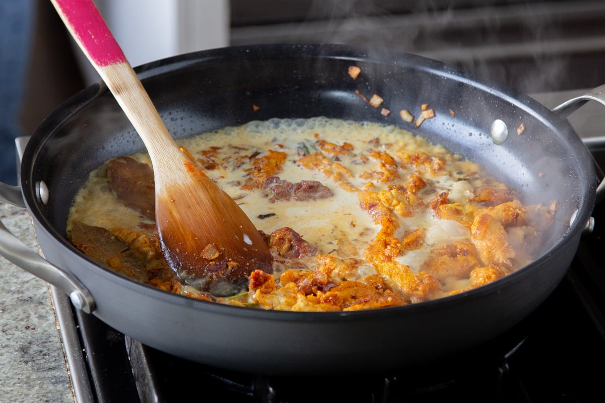 adding the wet ingredients to the pan with the soy curls