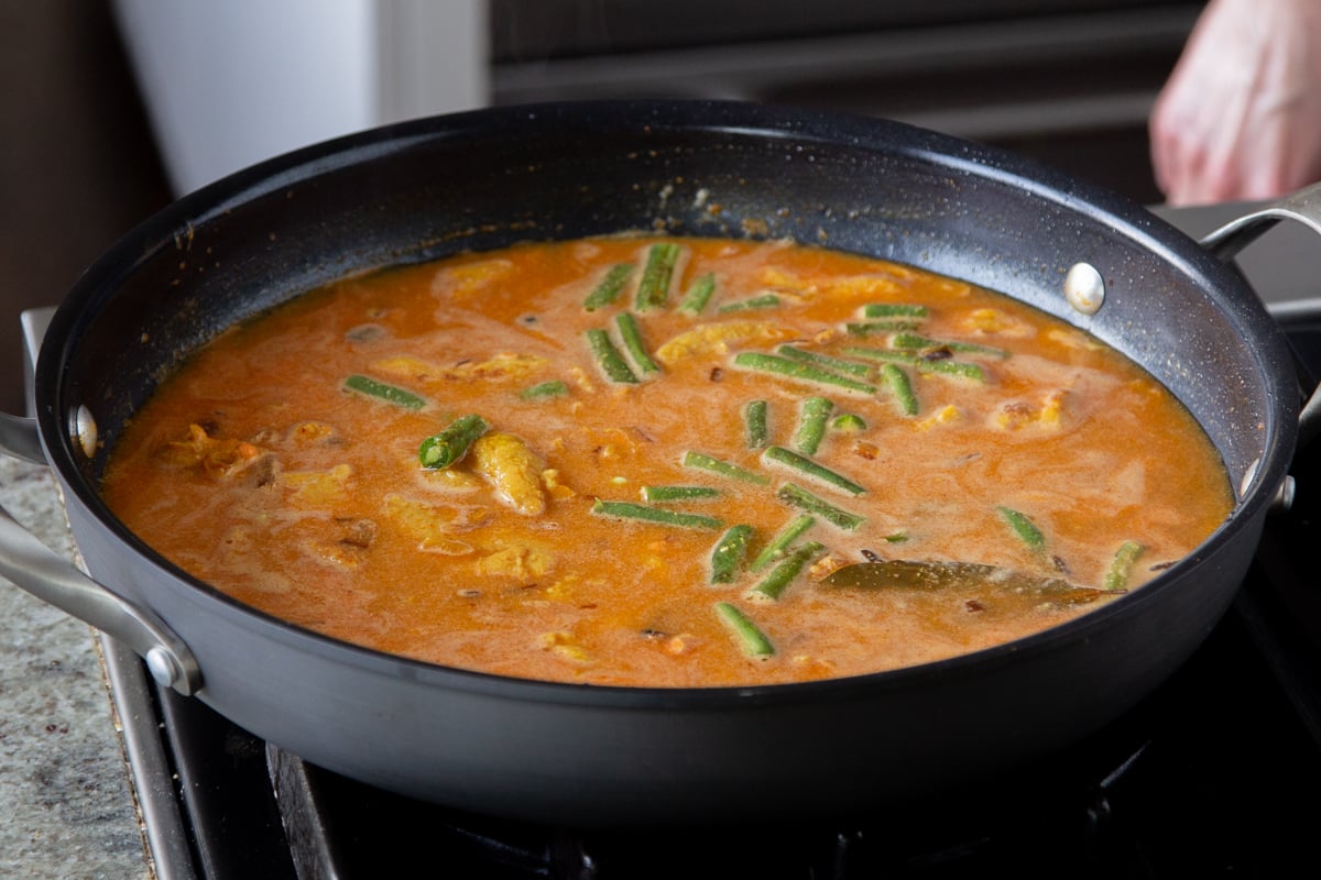 adding green beans to the lentil mixture