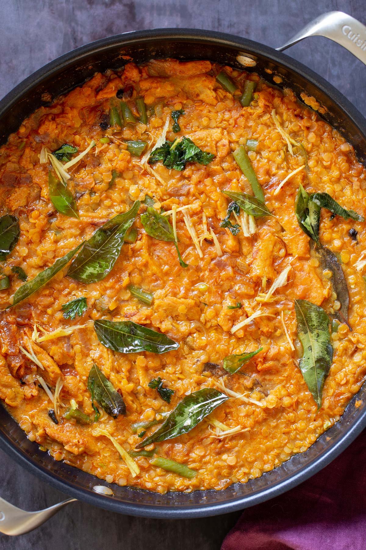 pan of vegan dalcha  with tempering on top