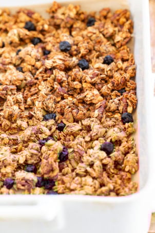 This Date Caramel Maple Pecan Granola is lightly sweet and perfect for any time. Pecans, Oats, coconut, pumpkin and chia seeds and dried blueberries tossed in date caramel and baked to perfection. #Vegan #Granola #Glutenfree #Soyfree #Recipe #VeganRicha Can be nutfree.