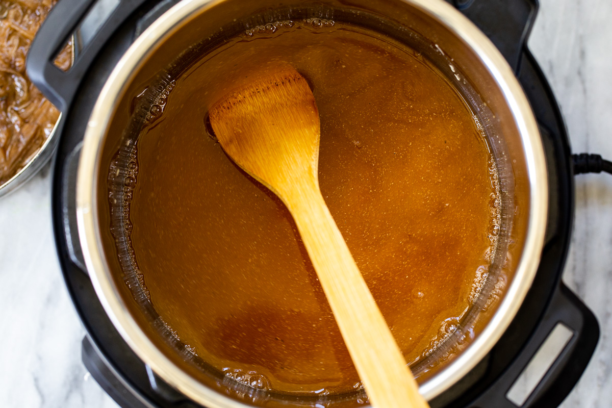vegan French onion soup simmering in an Instant Pot