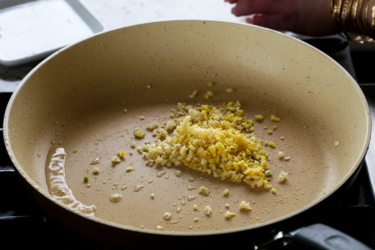 ginger and garlic in the pan before cooking