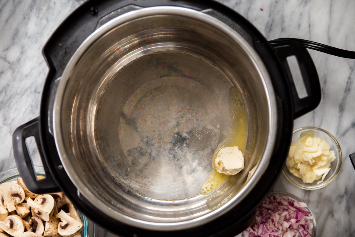 vegan butter being melted in an Instant Pot 