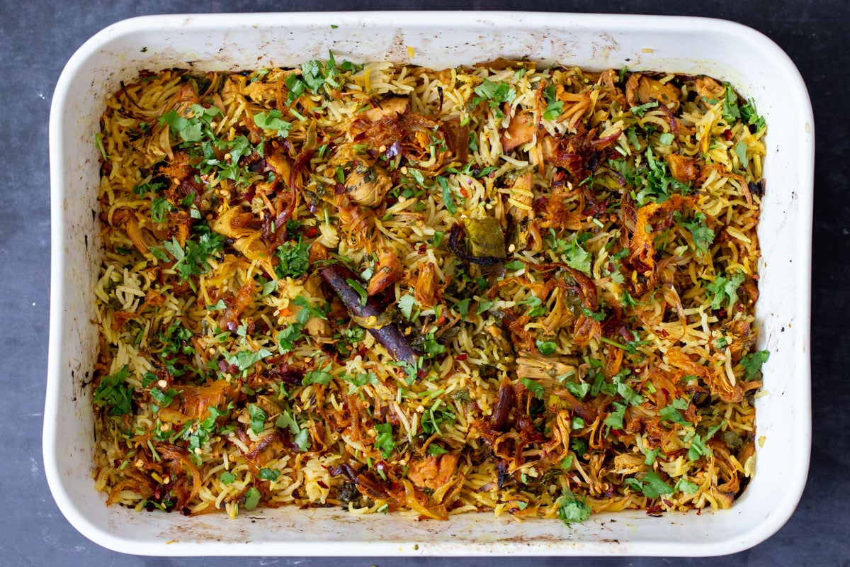 pan of jackfruit biryani with toppings
