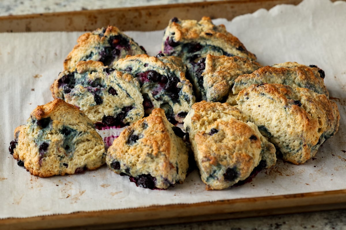 lemon blueberry scones on the baking sheet after baking