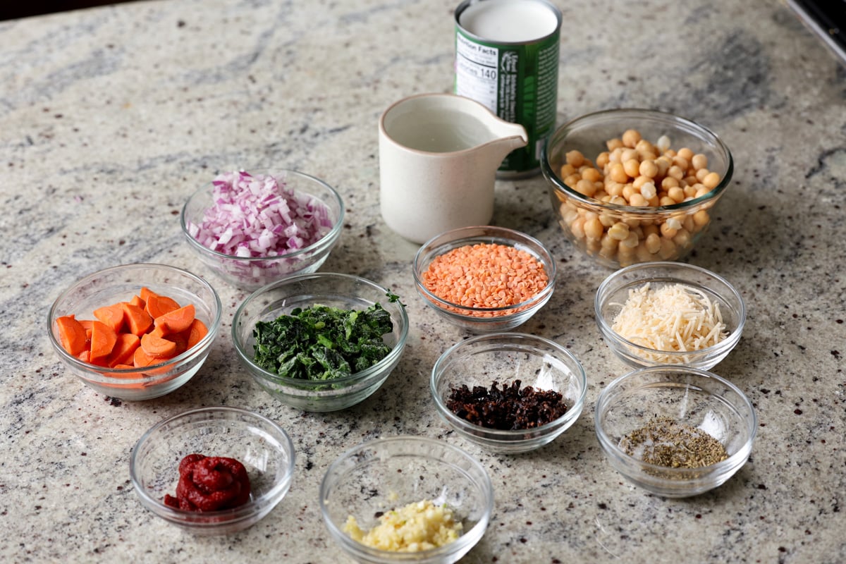 lentil chickpea stew ingredients in bowls on the kitchen counter