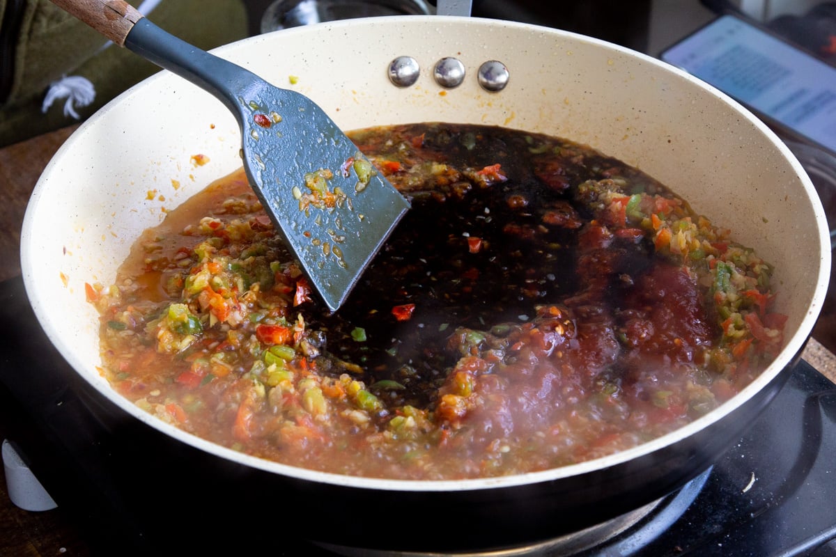 sweet and spicy Vegan Manchurian Noodle Sauce being prepared in a pan