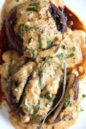 Grilled Portobello Mushrooms with Garlic Sauce. Grilled or Baked Marinated Portabella Mushrooms served with creamy gravy. #Vegan #Glutenfree #Recipe #veganricha | VeganRicha.com