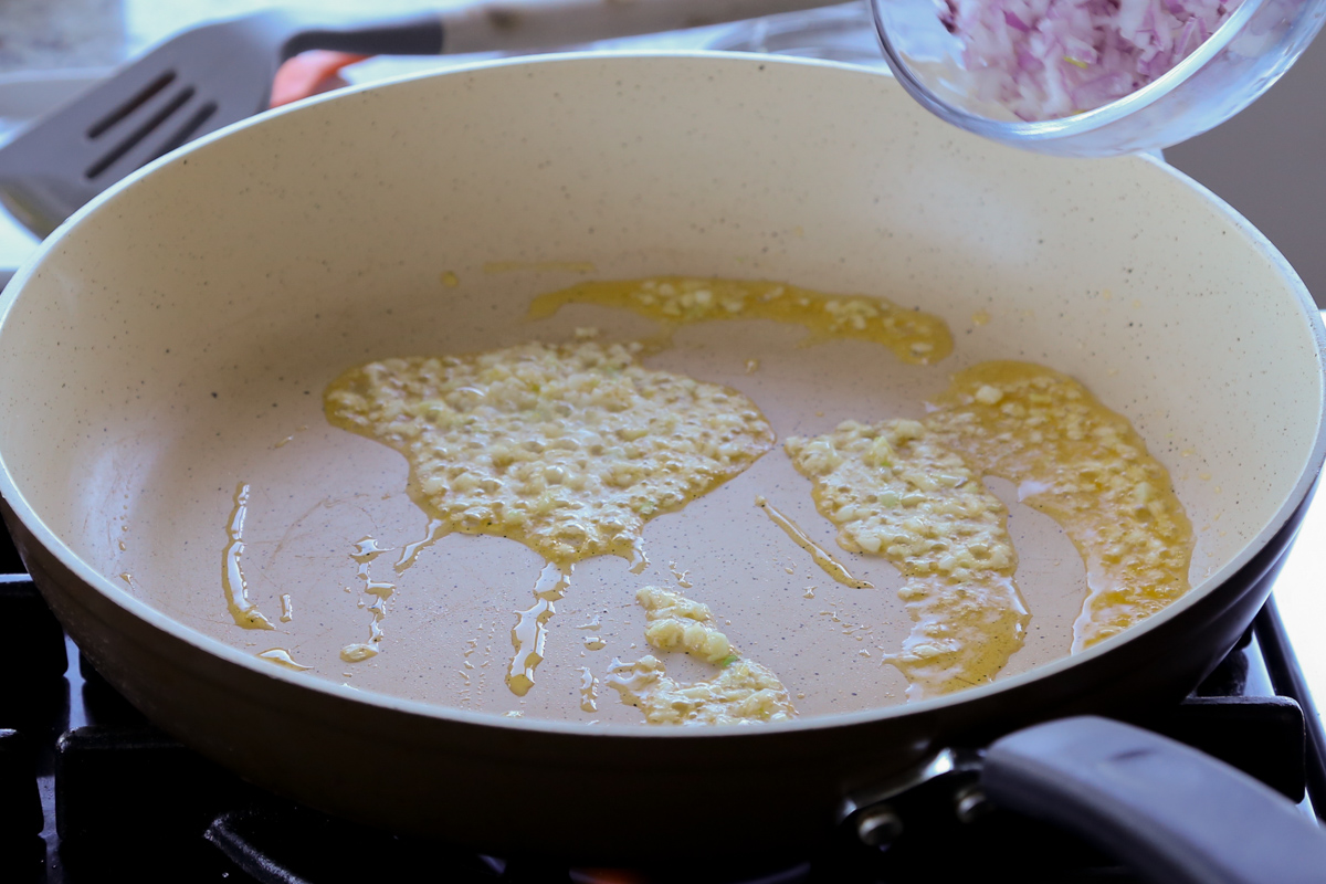 garlic sautéing in the pan