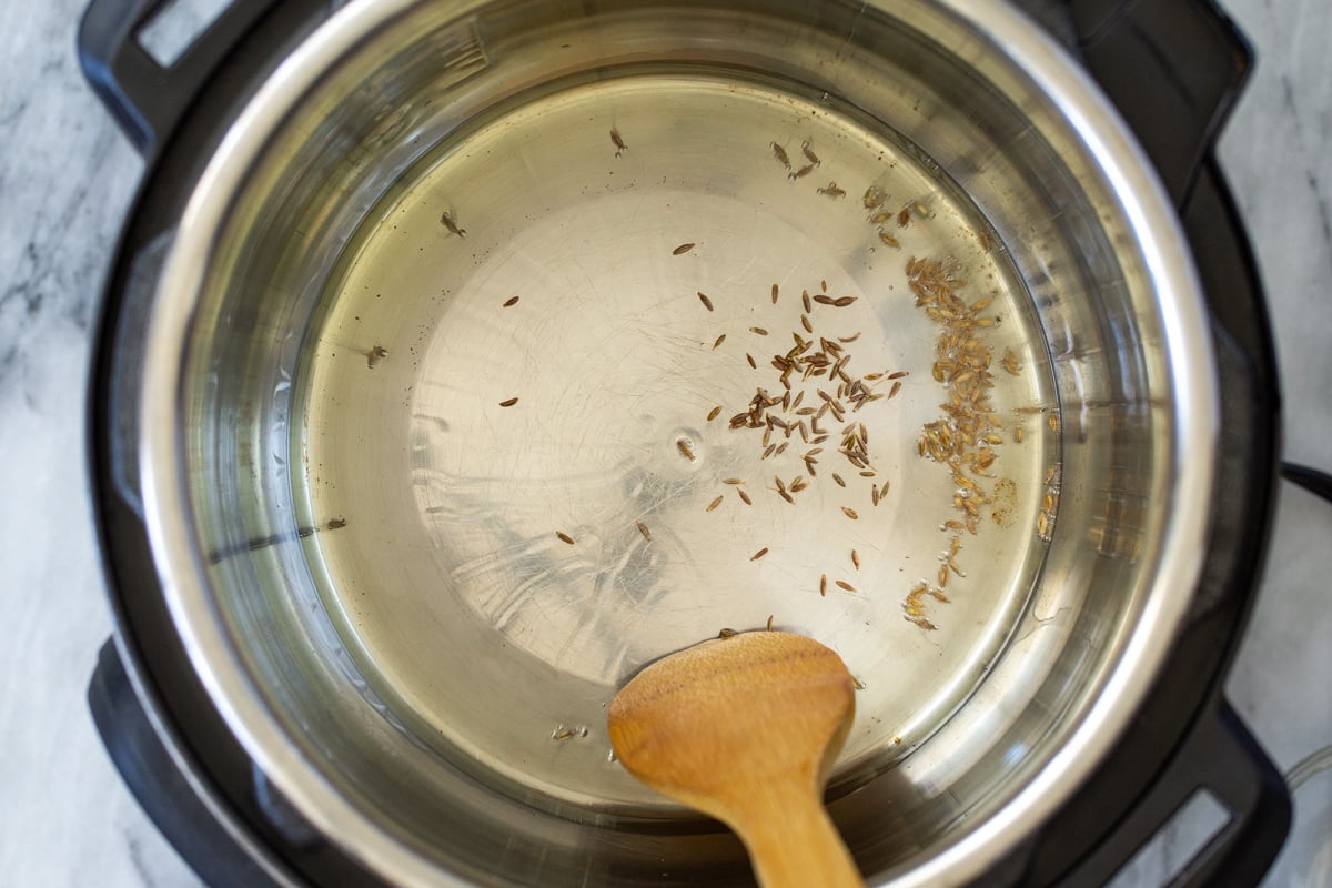 cumin seeds tempering in an Instant Pot 
