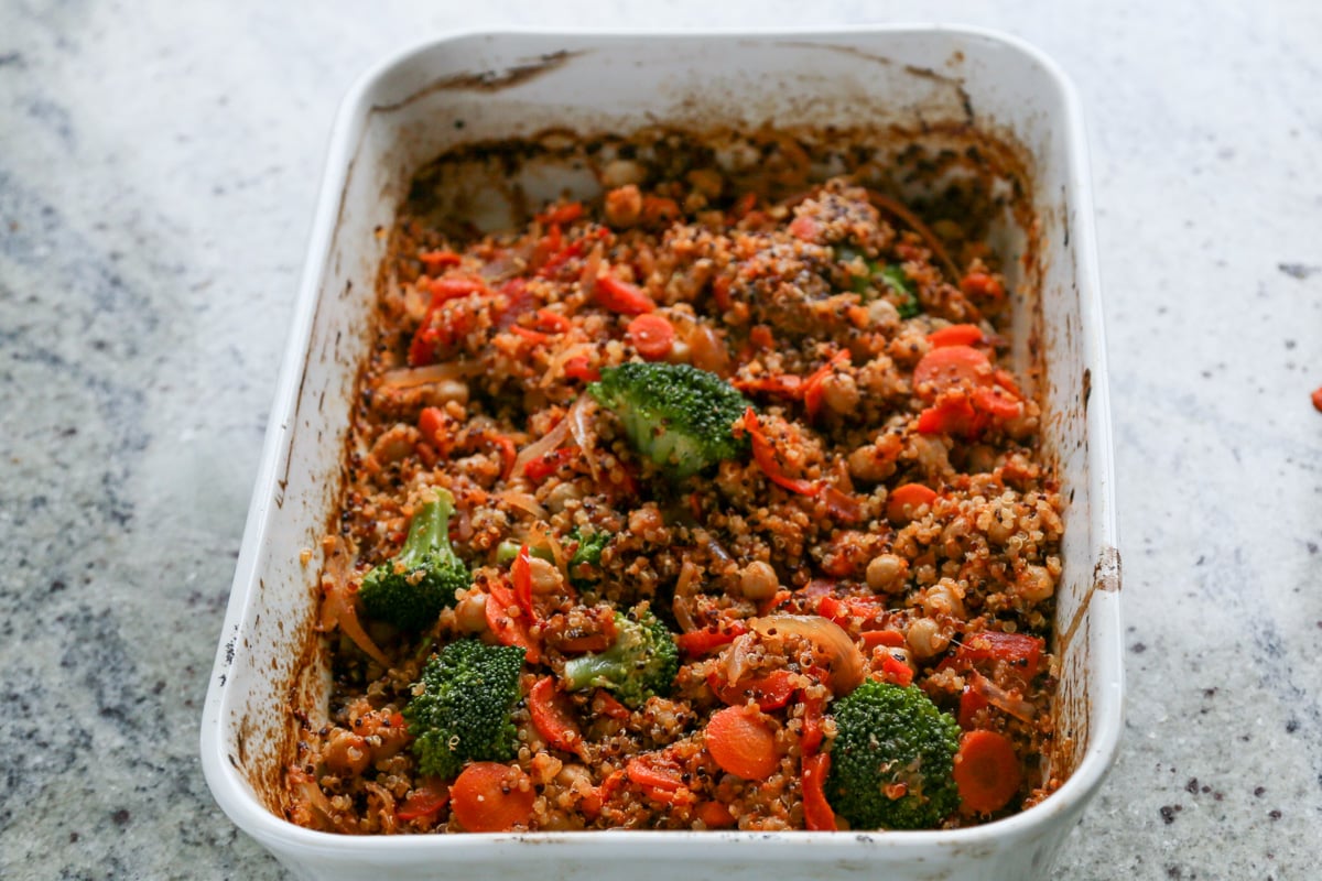 quinoa chickpea casserole in the pan after adding broccoli