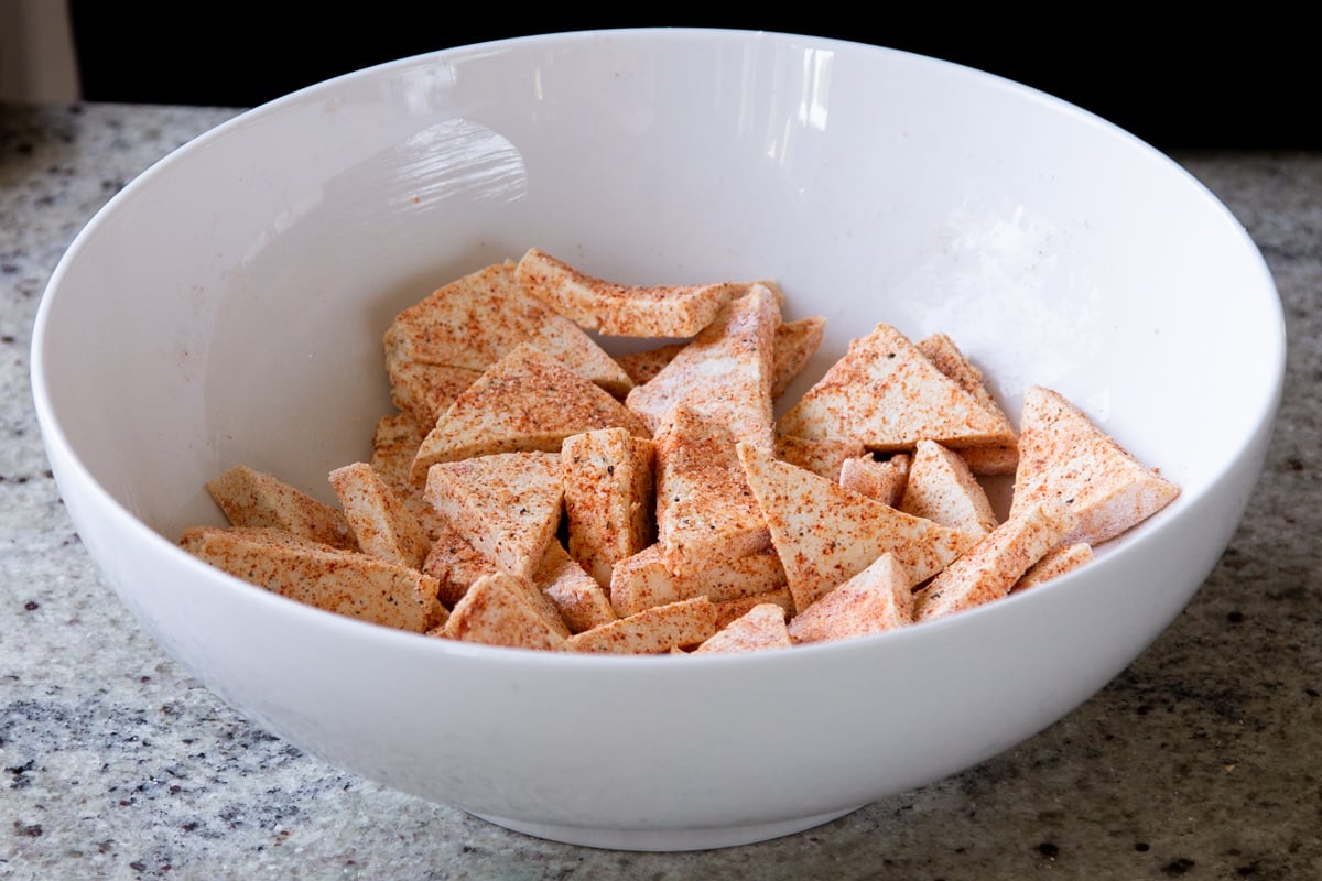 seasoned tofu in a white bowl