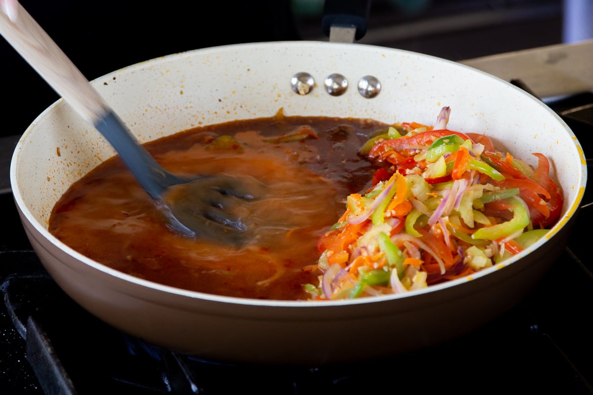 mixing the Szechuan sauce in the pan