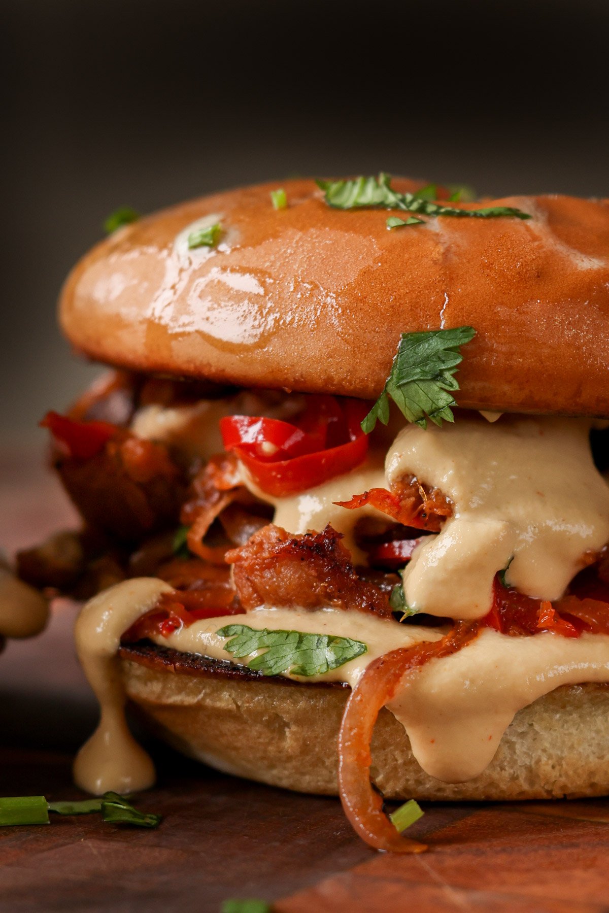 close-up of vegan cheesesteak sandwich on a cutting board