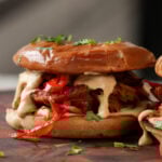 vegan cheesesteak sandwich on a cutting board