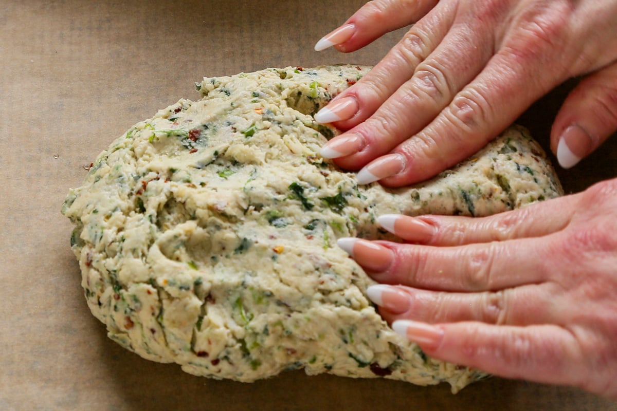 shaping the savory scone dough on the baking sheet