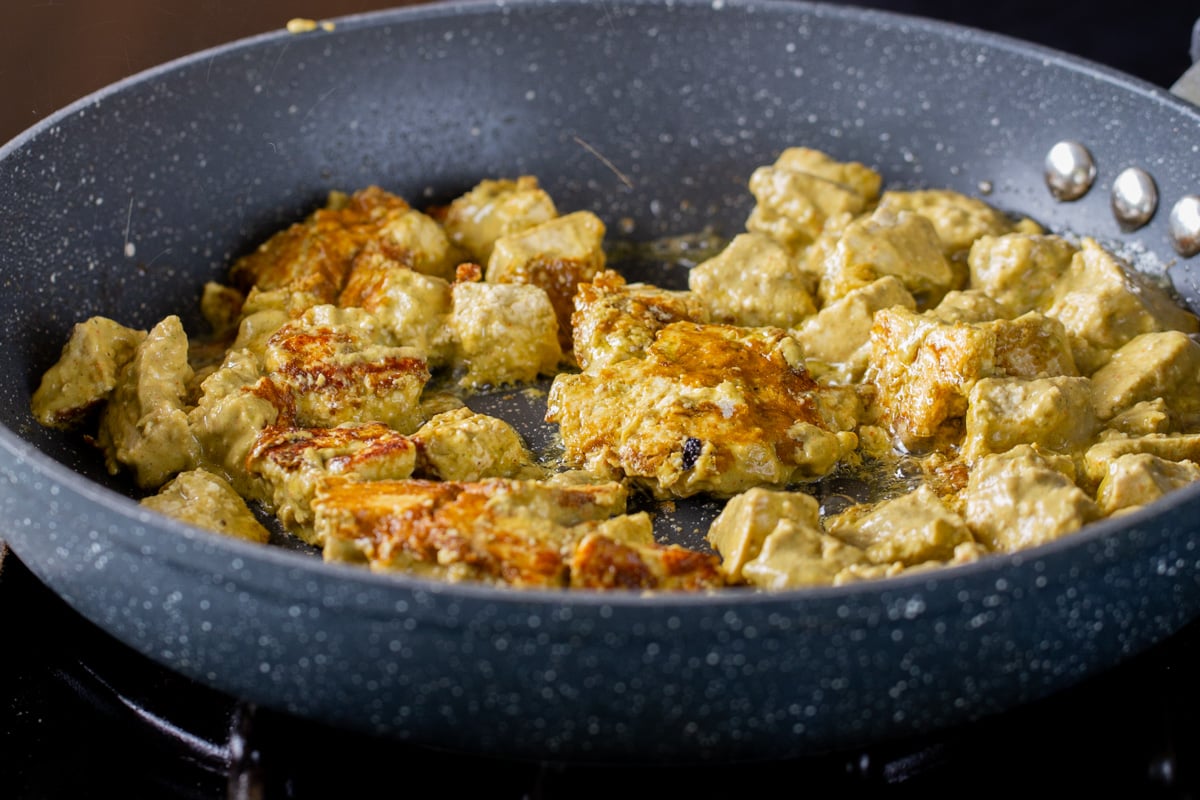 tofu cooking in the pan