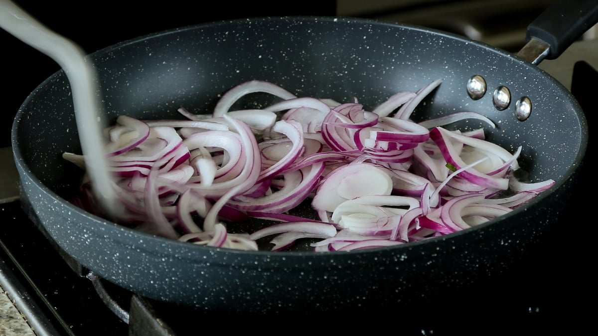 onions in the pan before cooking