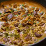 close-up of tofu barra in the pan after cooking and adding garnishes