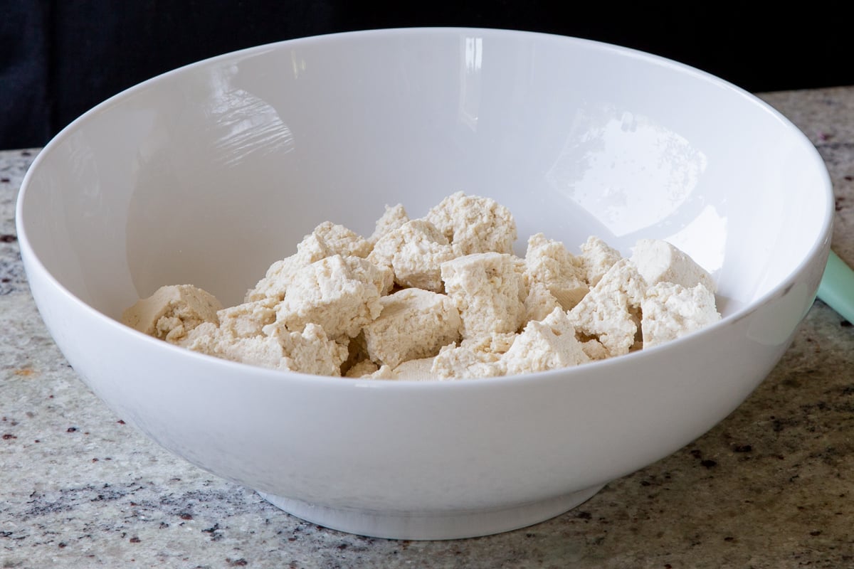 torn up tofu in the bowl