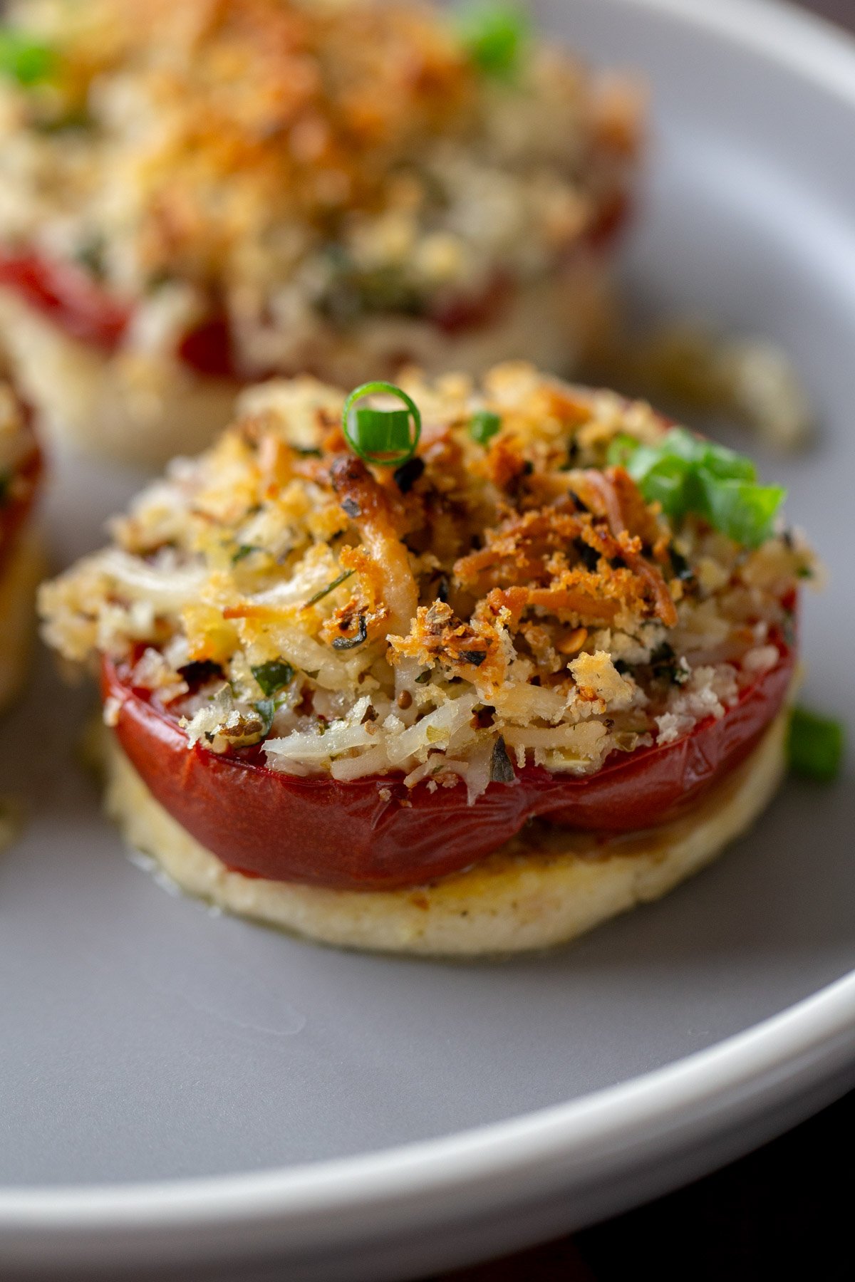 baked vegan caprese stacks on a plate