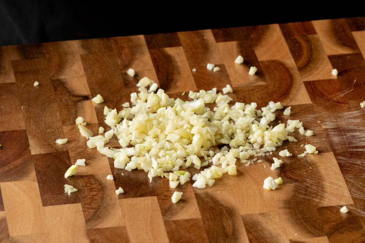minced garlic on a cutting board