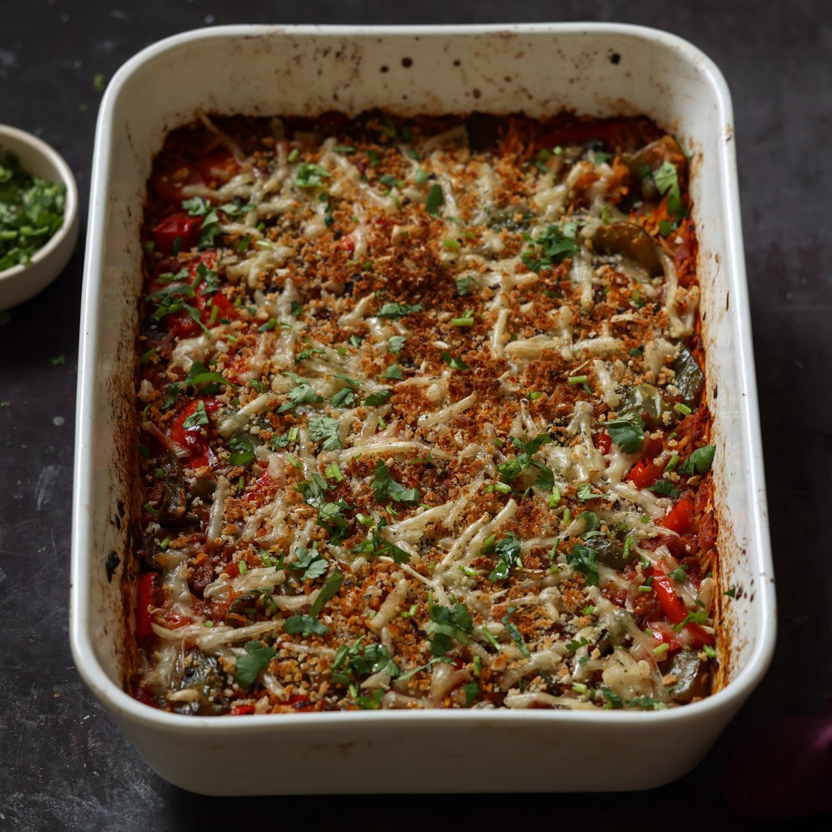 unstuffed pepper casserole in the pan after browning the topping