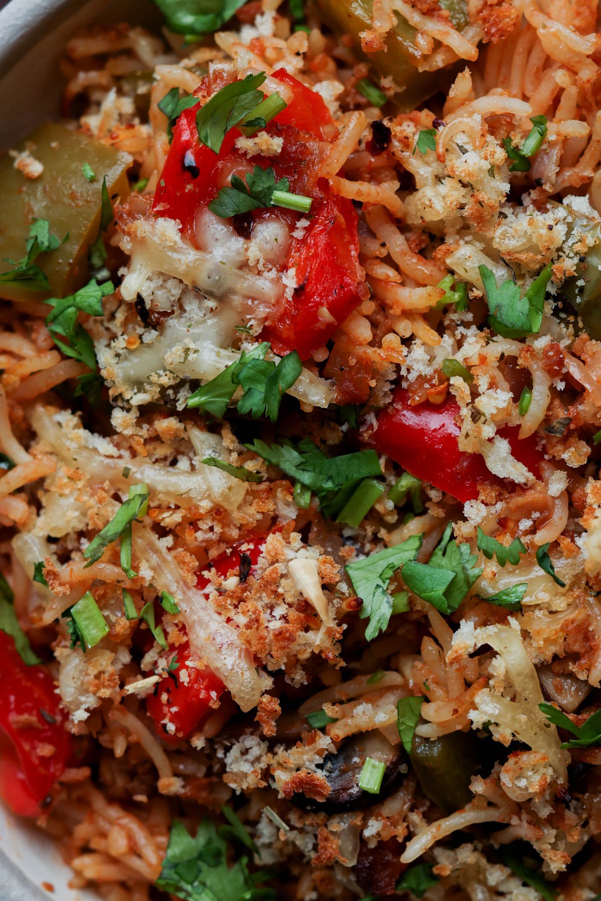 extreme close-up of a bowl of unstuffed pepper casserole