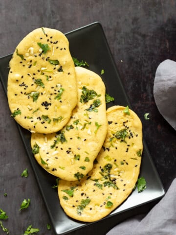 Vegan Gluten free Naan Flatbread. Grain-free Naan Recipe. 6 Main Ingredients,  1 Bowl, and 20 Minutes. Serve with curries or slice and serve with dips or add to bowls. Soyfree Nutfree options #Vegan #Glutenfree #grainfree #Veganricha #glutenfreenaan #grainfreenaan #chickpeaflournaan