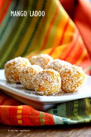 Mango Coconut Ladoo. Fudgy Mango balls made with Mango Puree, Coconut and almond meal. Vegan gluten-free recipe. Easy soy-free dessert or snack. | VeganRicha.com #glutenfree #veganricha #vegan