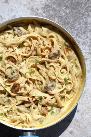 The Best Vegan Mushroom Garlic Alfredo with no nuts. Garlicky, Creamy, Amazing Vegan Fettuccine Alfredo. Nut-free, Easily Gluten-free, soy-free. | VeganRicha.com
