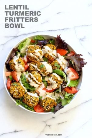 Turmeric Lentil Fritters Tomato Greens Bowl with Tahini Dill Sauce. Baked Seedy Golden Lentil fritters with greens, tomatoes and a tahini sauce make an easy Lunch bowl. Vegan Nut-free Soy-free Recipe. Easily Glutenfree | VeganRicha.com