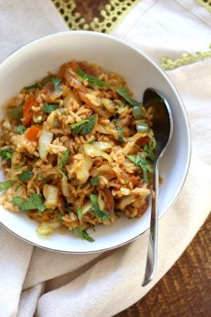 1 Pot, 30 Minute Veggie Spring Rolls Fried Rice! Fridge clean up fried rice with cabbage, carrots, bell pepper,  with rice or other cooked grains for a quick weeknight meal. Vegan Gluten-free Nut-free Recipe | VeganRicha.com