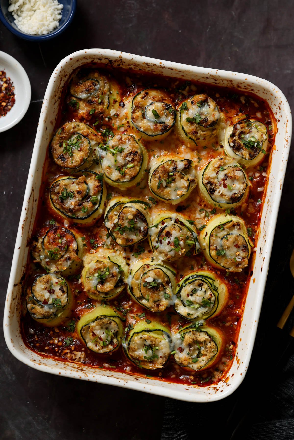 zucchini rolls in the baking dish after baking